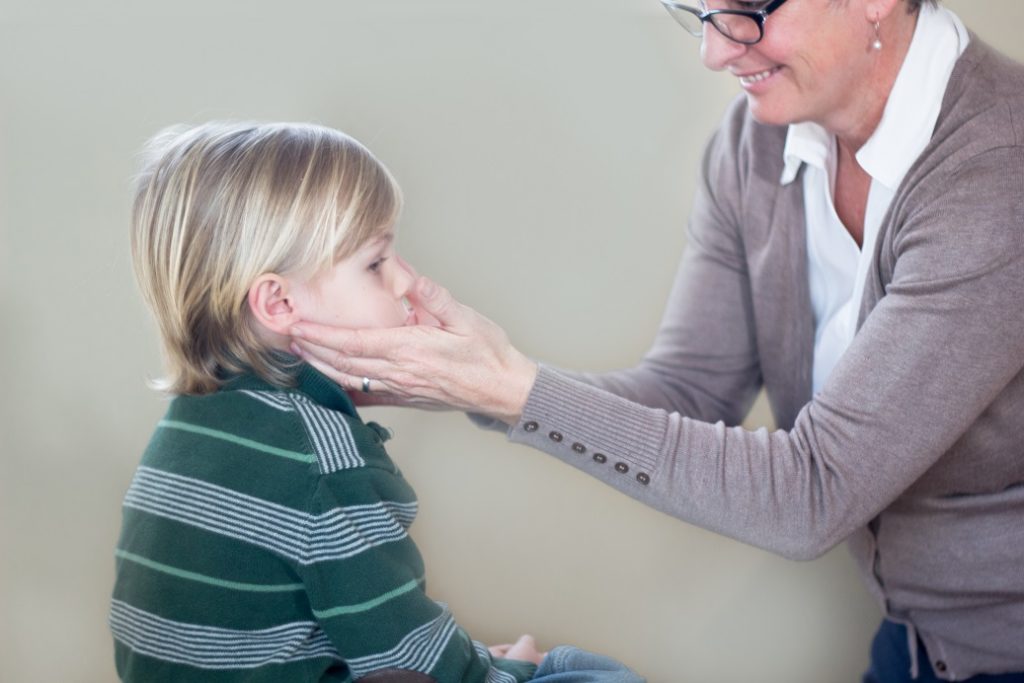 Dr. Haynes Assessing Patient